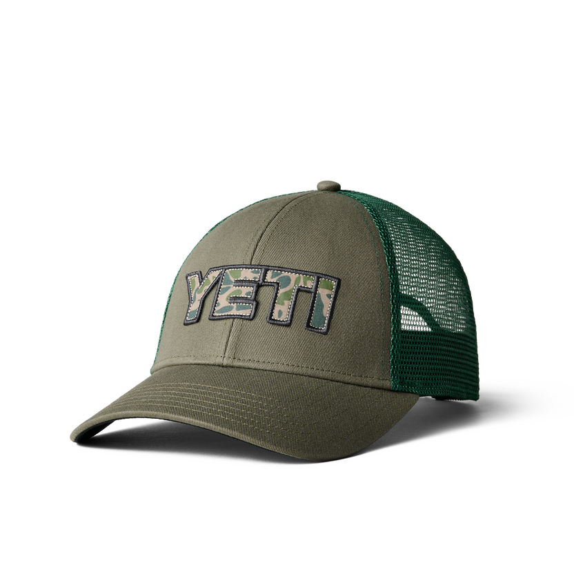 YETI CAMO LOGO BADGE TRUCKER HAT