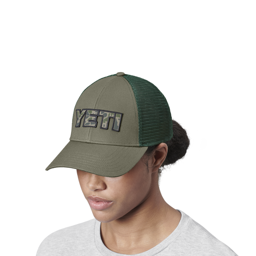 YETI CAMO LOGO BADGE TRUCKER HAT