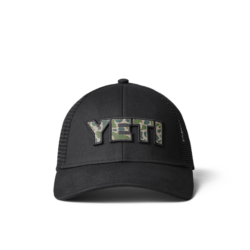 YETI CAMO LOGO BADGE TRUCKER HAT